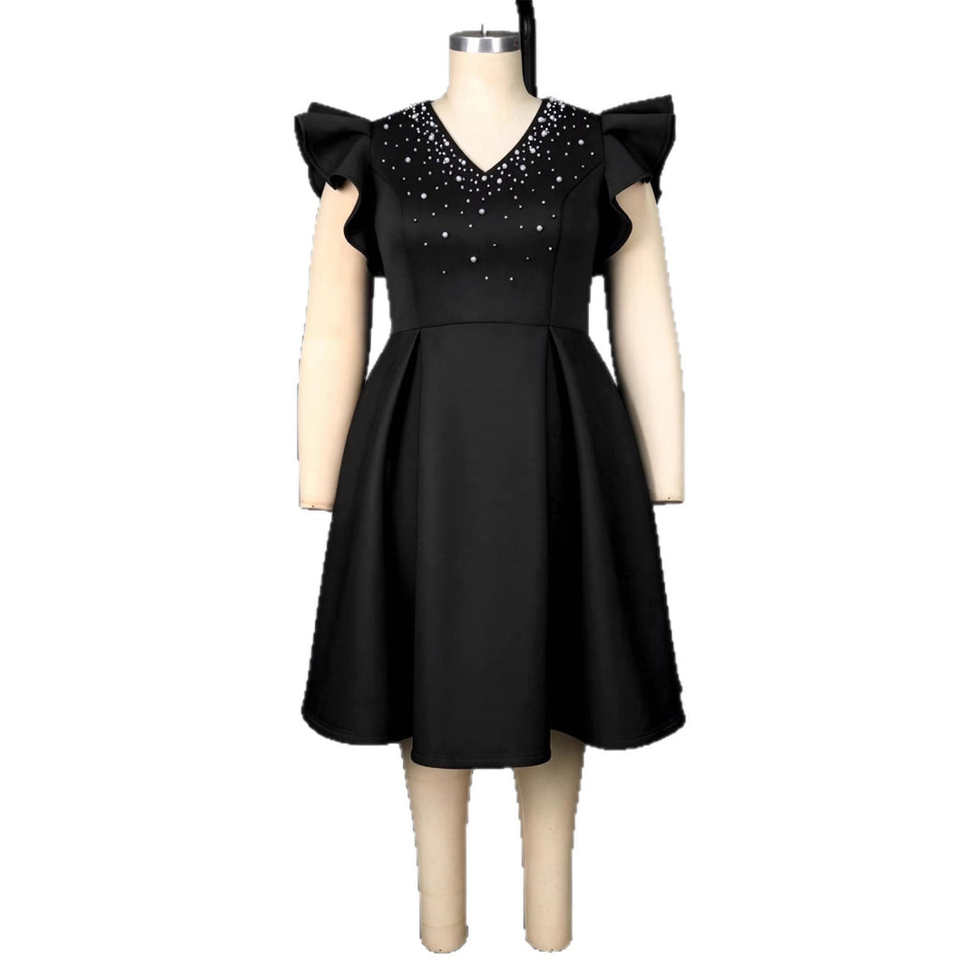 Figurschmeichelndes Abendkleid für Damen, mit funkelndem Strass und stilvollen, voluminösen Ärmeln.