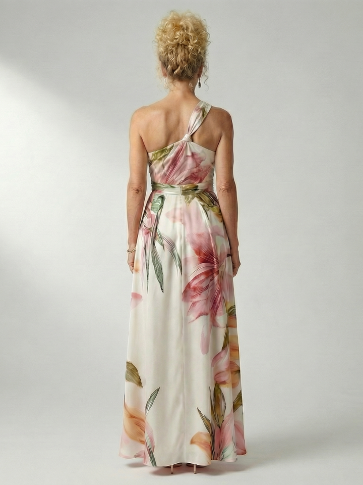 Detailaufnahme: Weißes Amiel Blumen Maxikleid mit lila-rosa Blüten; ärmellos, Neckholder. Luftiger Sommer-Stoff.