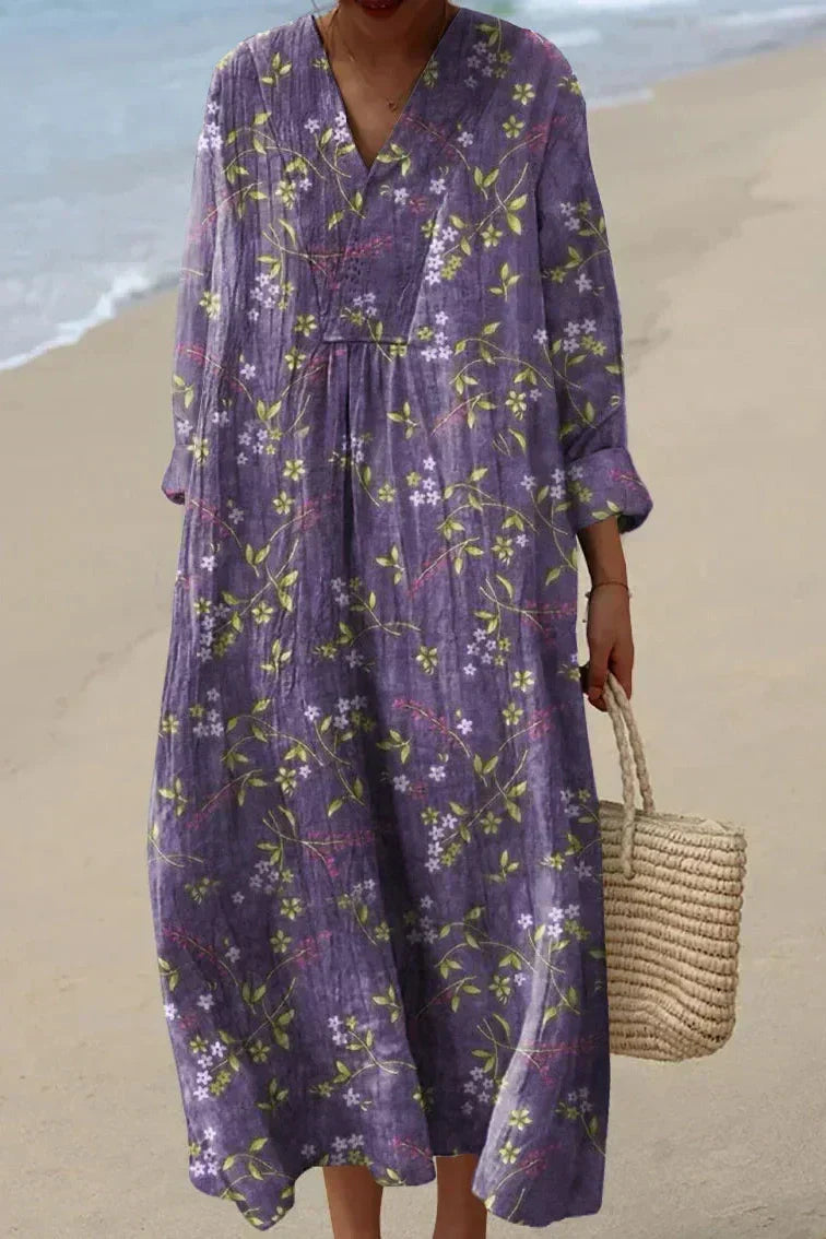 Luftiges Damen Sommerkleid Ella im Freizeit-Stil. Lockeres Midikleid mit frischem Blumenmuster für warme Frühlingstage.
