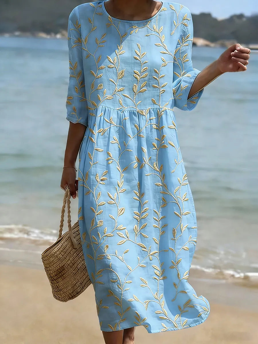 Elegantes Damen Blumen Midikleid Natalie mit Rundhalsausschnitt, vielseitig für Sommer und Freizeit.