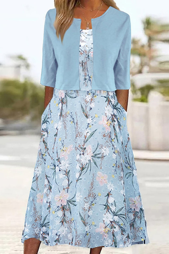 Damenkleid mit Blumenmuster, zweiteiliger Schnitt, Midilänge, halbärmlig und Rundhalsausschnitt für vielseitige Looks.