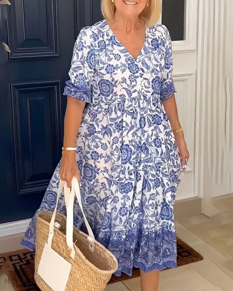 Elegantes Damen Blumenkleid, knielang mit V-Ausschnitt, tailliert. Perfekt für Sommer & Freizeit.