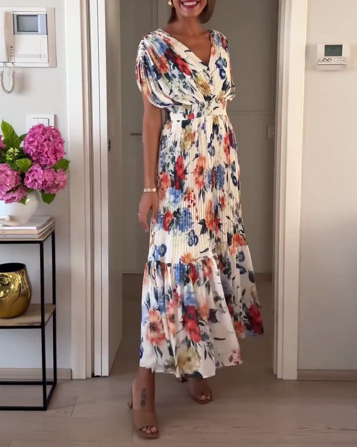 Elegantes Damenkleid mit Blumenmuster, stilvoll für besondere Anlässe oder als schickes Freizeitkleid.