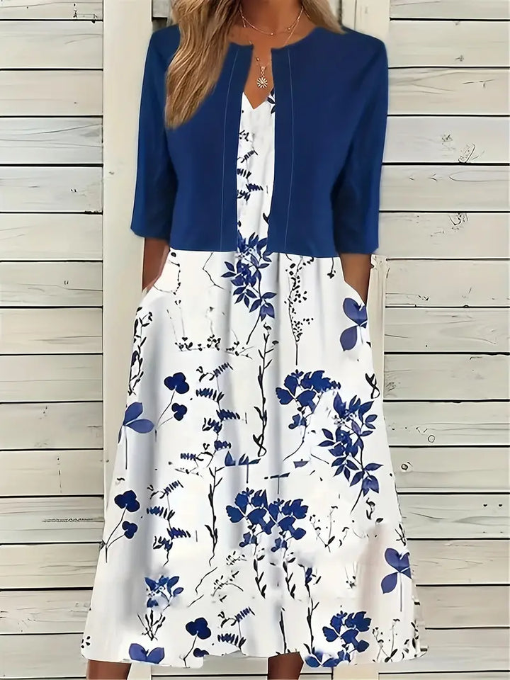 Modernes Damen Blumenkleid Set: Crop-Top und Rock mit ansprechendem floralem Design.