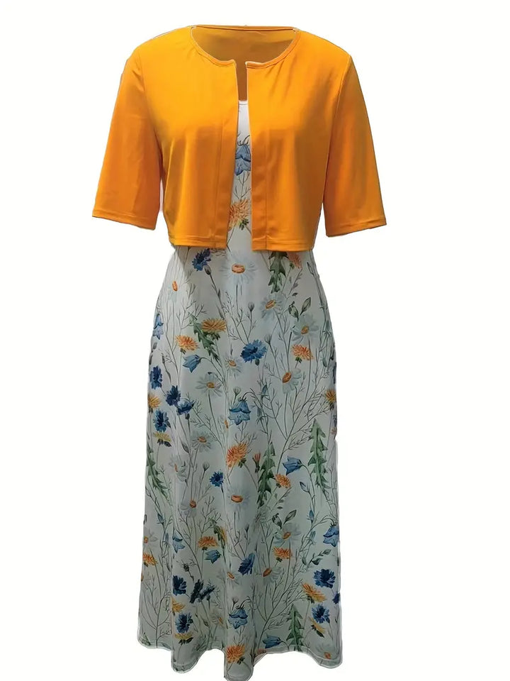 Vorderansicht des Damen Zweiteiler Sets: Crop-Top und geblümtes Midikleid, ideal für Urlaube.