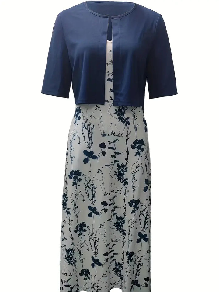 Attraktives Freizeitkleid Set für Damen, kombiniert ein Crop-Top mit einem floralen Rock.