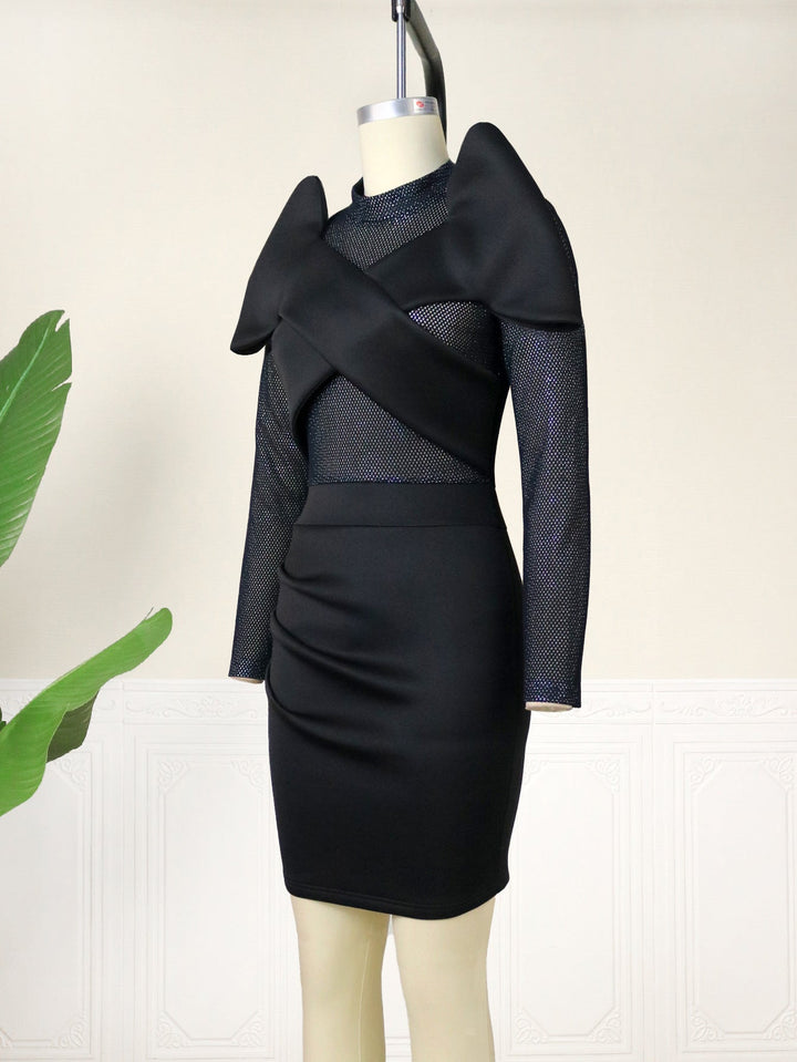 Schickes Partykleid für Damen, elegant geschnitten mit auffälligen Rüschen – ideal für festliche Events.