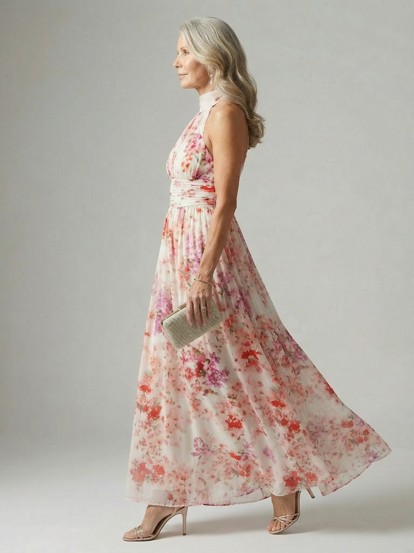 Leichtes, fließendes Damen Maxikleid mit Blumenprint und Halterausschnitt. Ideal als bequemes Sommerkleid.