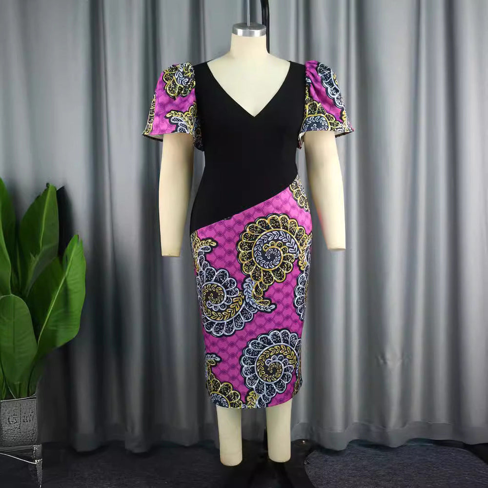 Feminines Partykleid mit buntem Mustermix & eleganten Puffärmeln. Modisches Etuikleid für Abend & Freizeit.