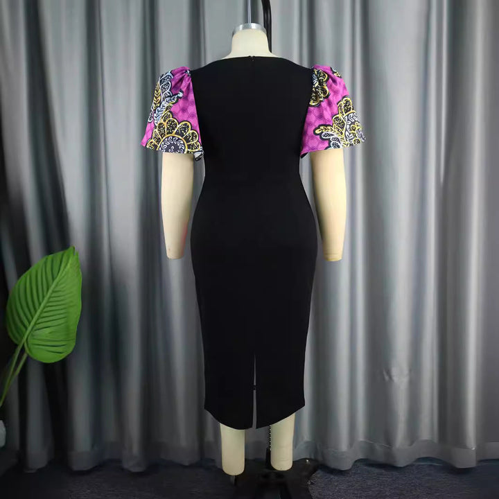 Damen Etuikleid mit auffälligem Mustermix, trendigen Puffärmeln und tiefem V-Ausschnitt. Elegantes Freizeitkleid.