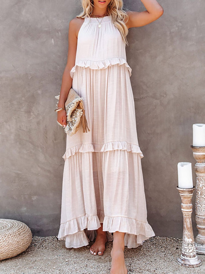 Modell trägt luftiges Damen Frühlings-Midi-Kleid. Knitterarm & blickdicht, perfekt als Reise- oder Freizeitkleid.