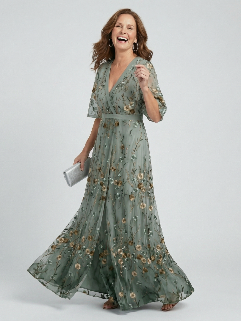 Elegantes Damen Halterneck Midikleid in Salbeigrün mit Blumenmuster, leicht für Sommer & Strand.