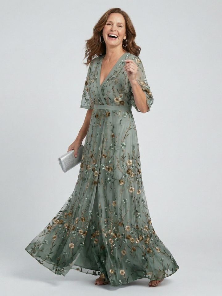 Elegantes Damen Halterneck Midikleid in Salbeigrün mit Blumenmuster, leicht für Sommer & Strand.