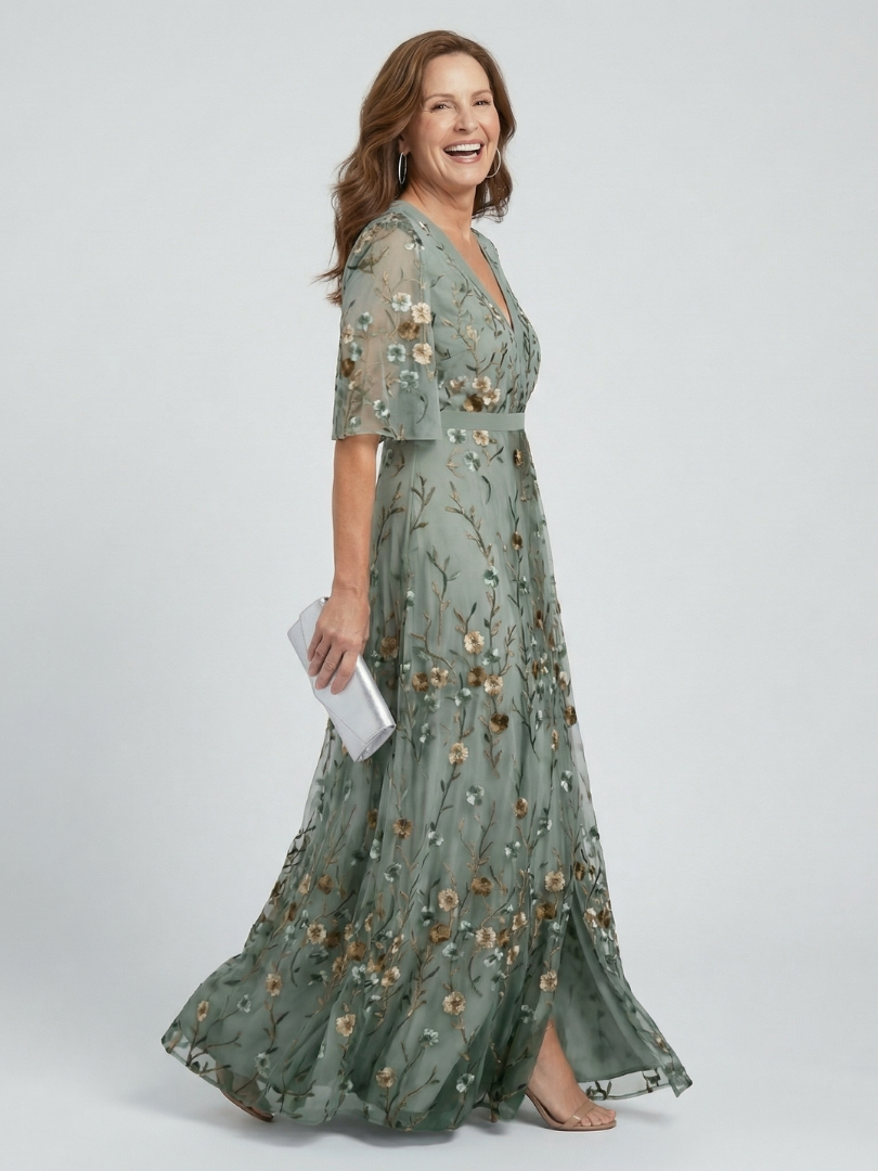 Leichtes, elegantes Damen Midikleid mit Blumenmuster und Halterneck, ideal als Freizeit- oder Sommerkleid.