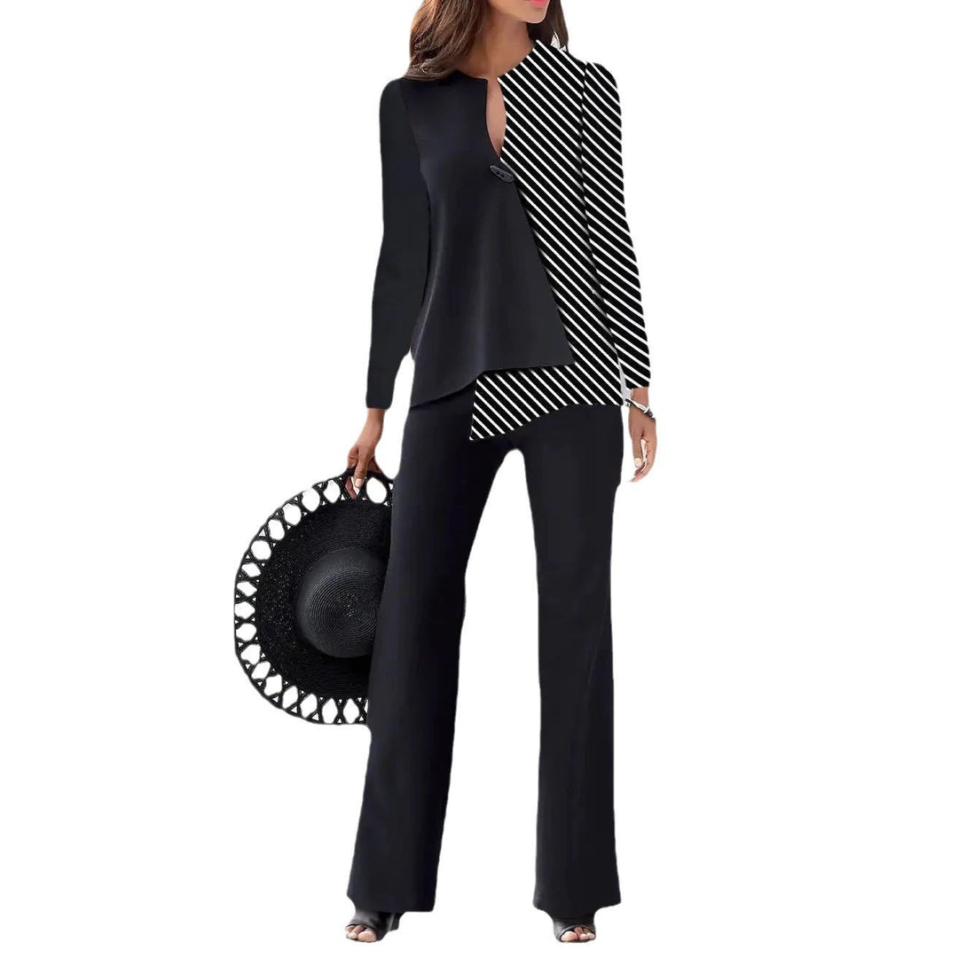 Stylisches Damen Freizeit Outfit: modernes Hosenanzug Set mit asymmetrischer Bluse für einen eleganten Look.