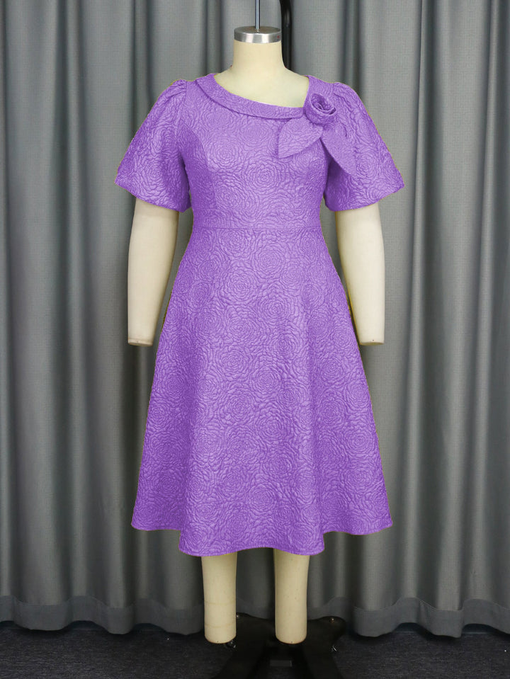 Elegantes Sommer-Partykleid für Damen: Blumendruck, Schleife, Puffärmel, knielang.