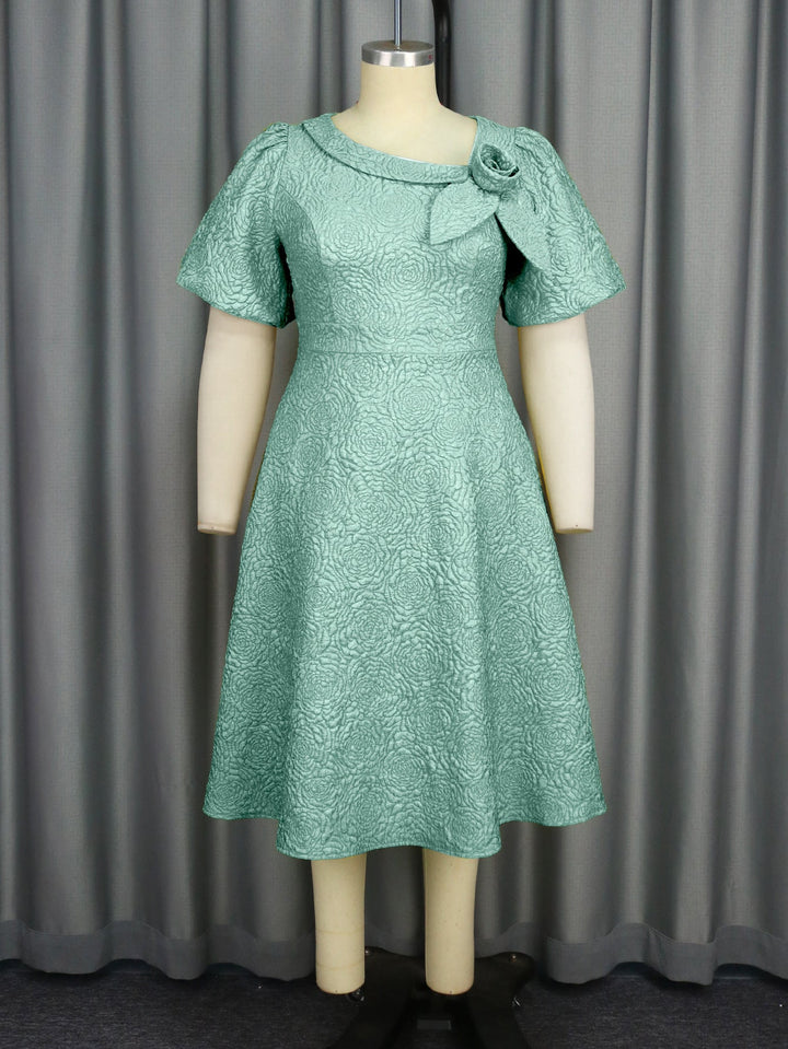 Partykleid für besondere Anlässe: Damenkleid mit Blumendruck, Schleife & Puffärmeln.