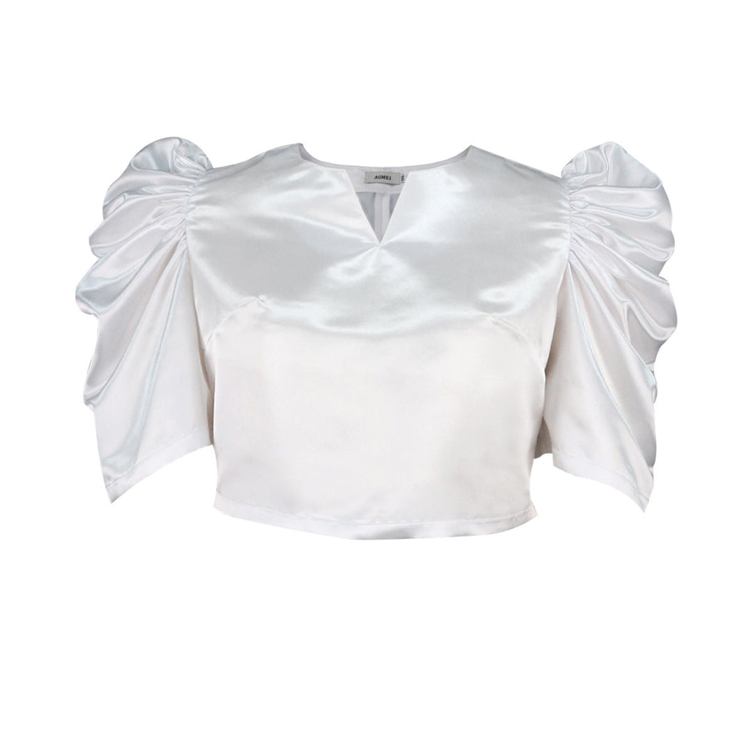 Festliches Damen Top mit eleganten Puffärmeln und tiefem V-Ausschnitt. Vielseitiges Kurzarm-Oberteil für chicen Sommer-Look.