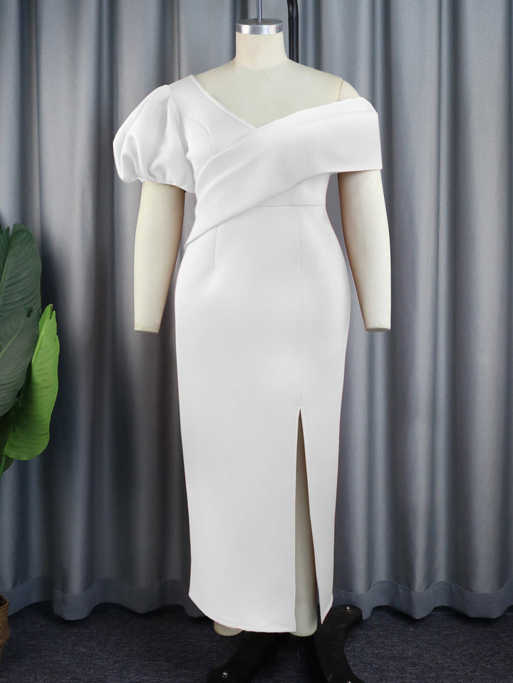 Trendiges Damen Maxikleid: Asymmetrischer Ausschnitt, voluminöse Puffärmel. Perfekt für Abend-Events.