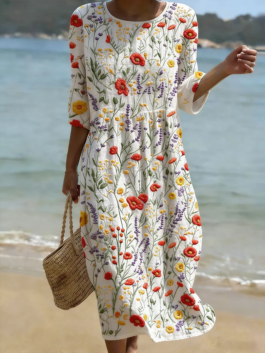 Elegantes Damen Maxikleid mit farbenfrohem Blumenmuster und Rundhals, ideal als Sommer- oder Freizeitkleid.