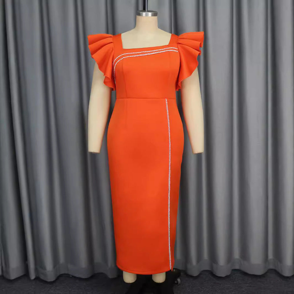 Festliches Abendkleid für Damen, langes Design mit auffälligen Puffärmeln und dezentem Glitzer.