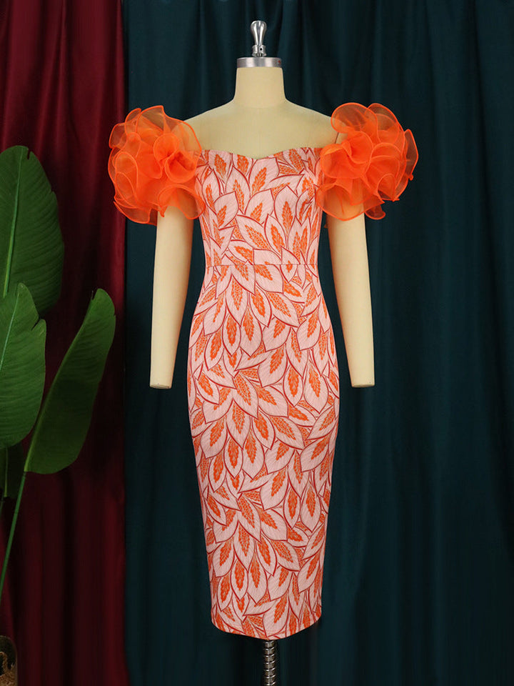 Damenfashion: Festliches Midi-Kleid mit detailliertem Kunstdruck & stilvollen Puffärmeln. Für jeden Anlass.
