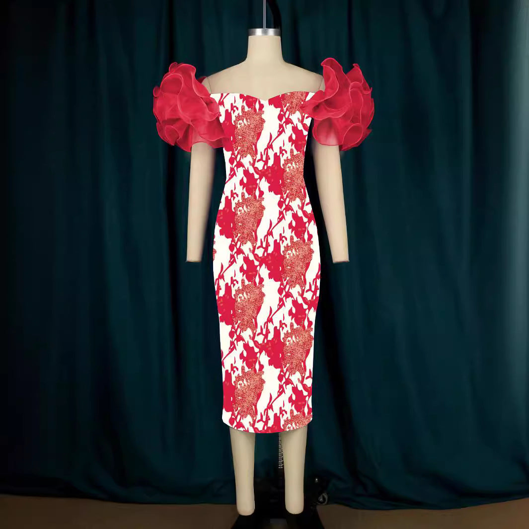 Anmutiges Damen Midi-Kleid mit farbigem Kunstdruck, Puffärmeln & schmeichelhafter Silhouette. Für stilvolle Auftritte.