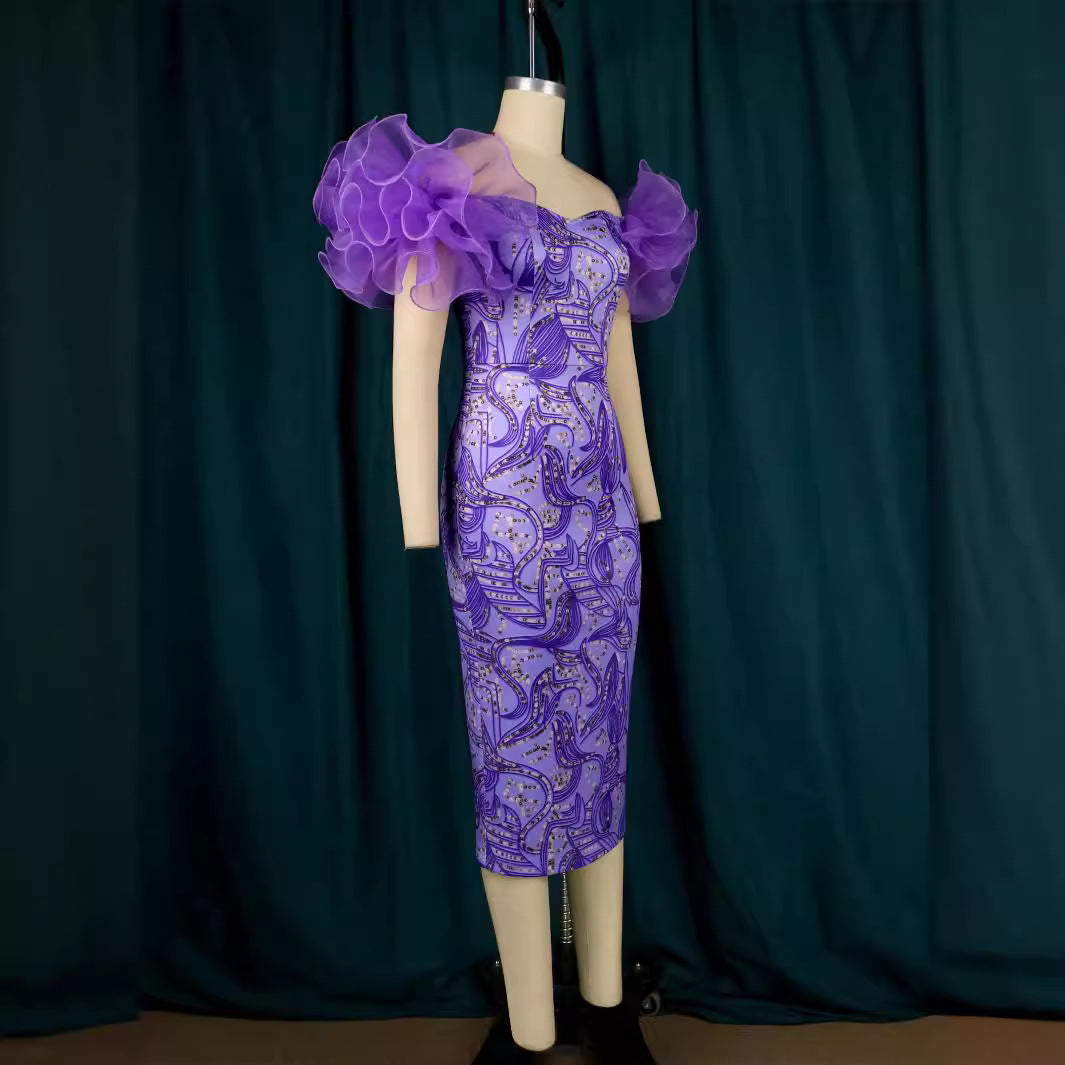 Festliches Damenkleid, bedruckt, mit eleganten Puffärmeln. Must-have für stilvolle Sommerabende & Events.