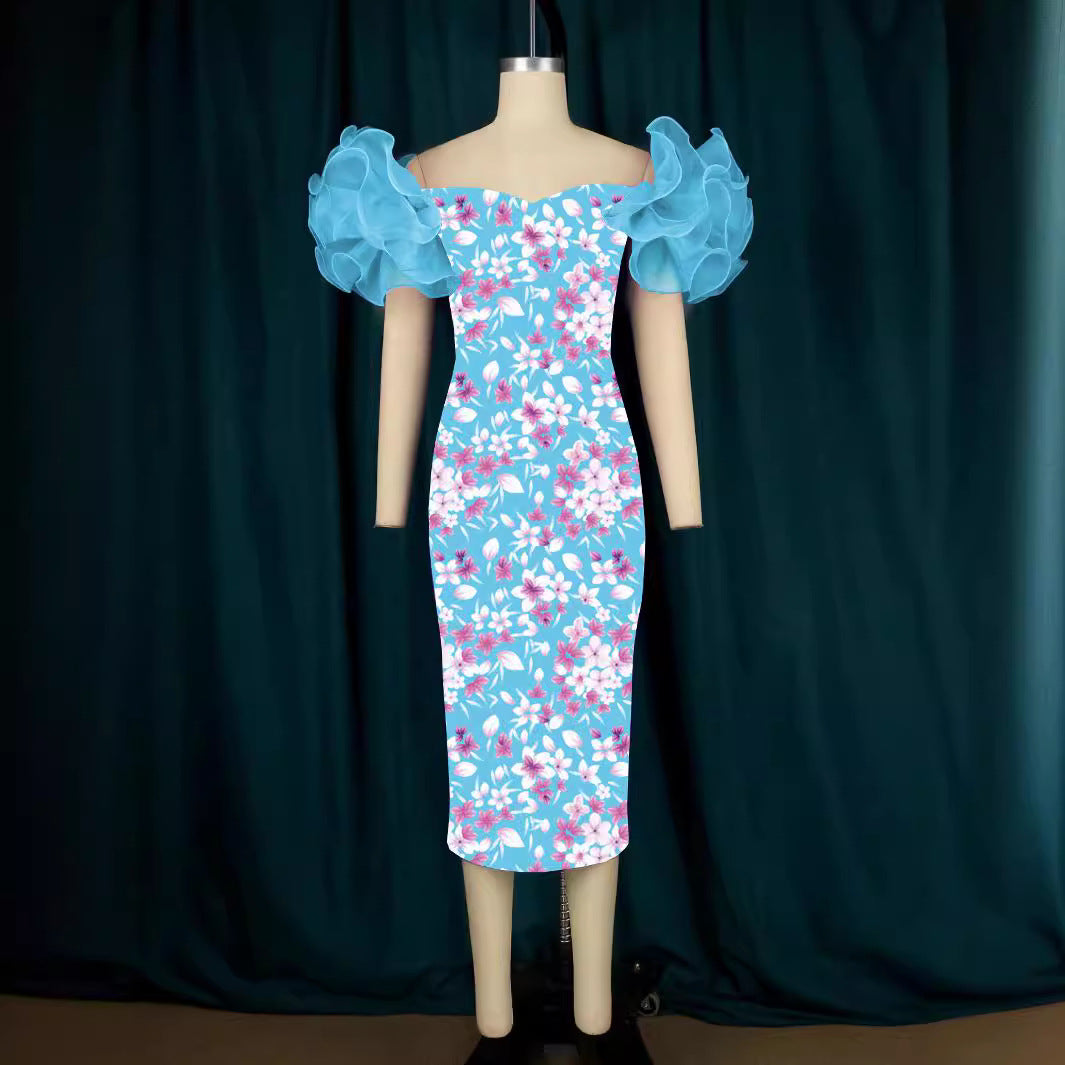 Kunstdruck Midi-Kleid für Damen, mit modernen Puffärmeln & figurumspielendem Schnitt. Ideal für festliche Anlässe.