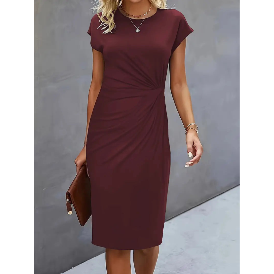 Hochwertiges Damen Midi-Kleid mit Taillenakzent, figurbetont und kurzärmlig. Elegant für Sommermode.