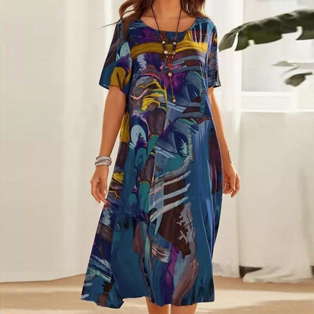 Elegantes Damen Midikleid mit abstraktem, mehrfarbigem Muster. Perfektes Freizeit- oder Festkleid für jeden Anlass.