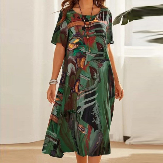 Bequemes Damen Midi-Sommerkleid mit abstraktem Design, ideal als stilvolles Alltagskleid oder Freizeitkleid.