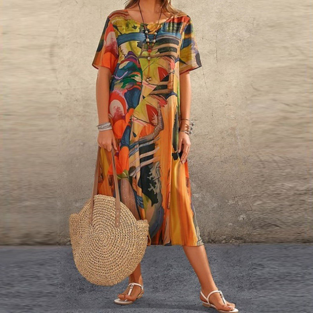 Damen Midikleid in abstraktem Design. Fließendes, bequemes Festkleid oder Alltagskleid mit elegantem Schnitt.