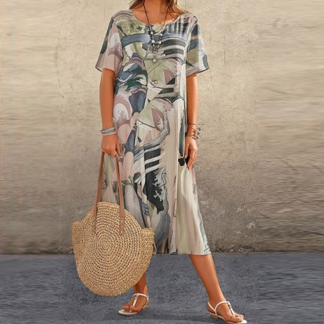 Stilvolles Damen Midikleid mit abstraktem, mehrfarbigem Muster für harmonische Eleganz im Alltag und festlich.