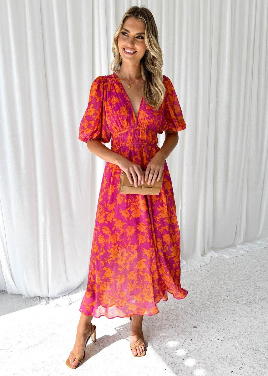 Elegantes Damen Midikleid mit Blumenmuster und stilvollen Puffärmeln; ideal für Frühling & Sommer.
