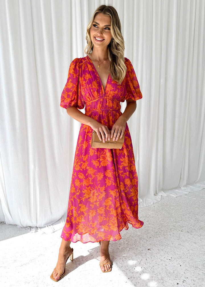 Elegantes Damen Midikleid mit Blumenmuster und stilvollen Puffärmeln; ideal für Frühling & Sommer.