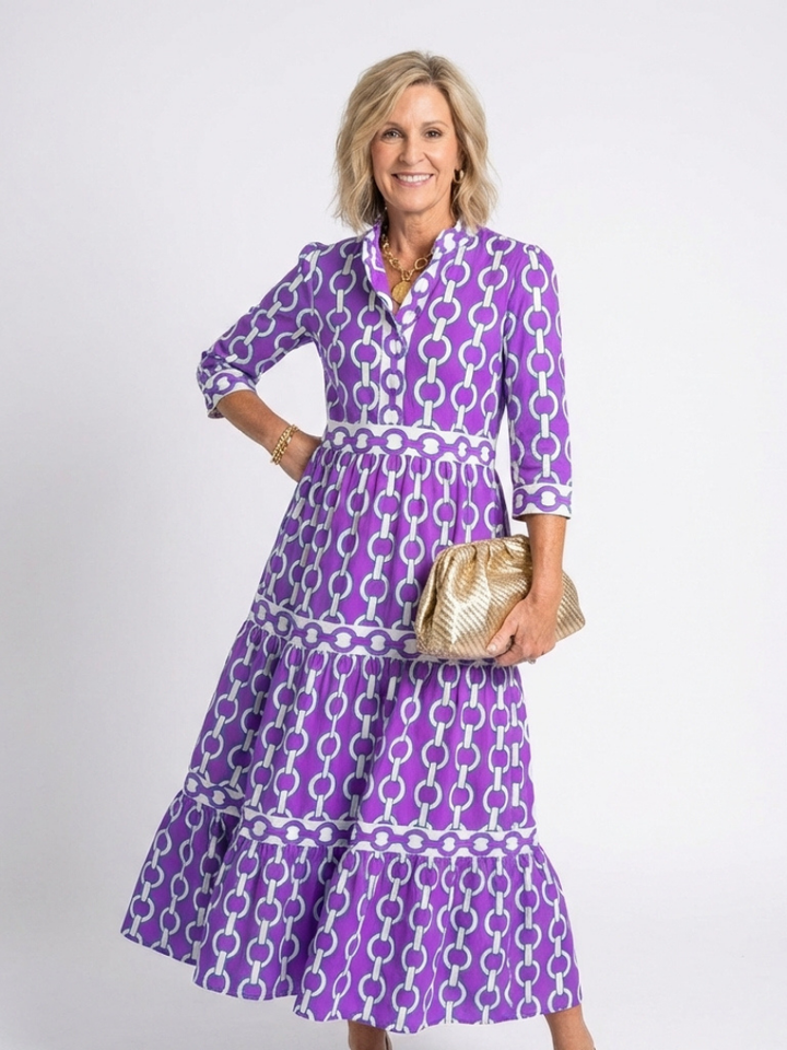 Modisches Damen Midikleid mit Dreiviertelärmeln, elegantem Kettenmuster. Figurumspielend und bequem für Büro oder Freizeit.