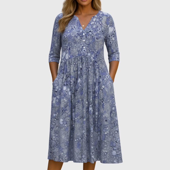 Rosa Damen Midikleid mit V-Ausschnitt, ein modisches und bequemes Freizeitkleid. Ideal für Sommerabende.