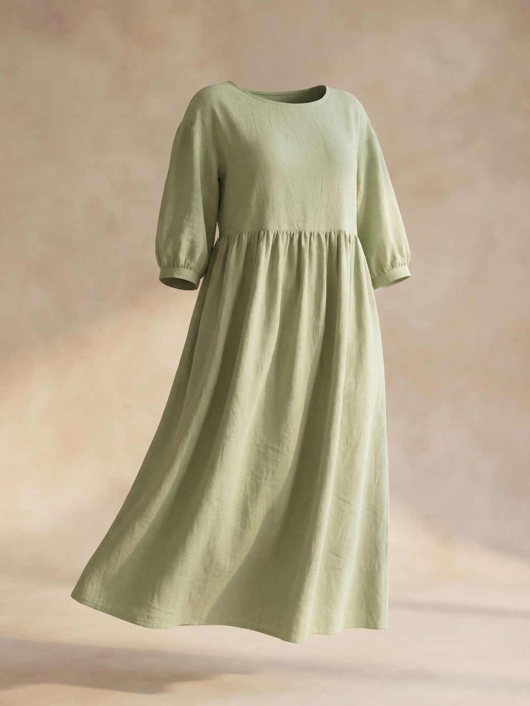 Elegantes Damen Midikleid Selina mit Rundhalsausschnitt und modischen Laternenärmeln für vielseitige Looks.