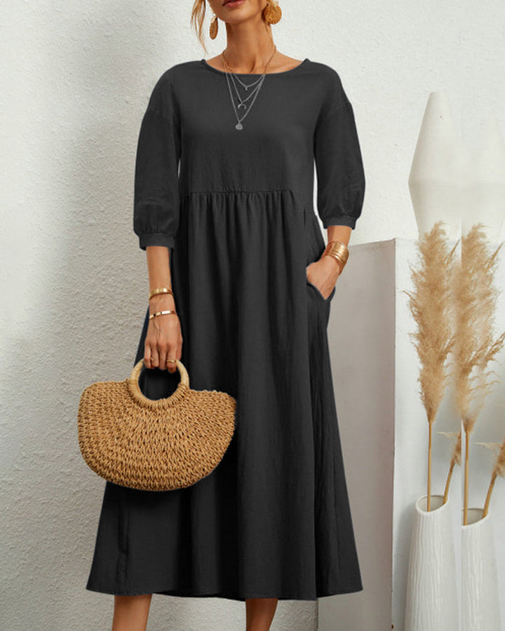 Leichtes Damen Midikleid Selina mit Laternenärmeln, ideal für elegante Frühling- und Sommeroutfits.