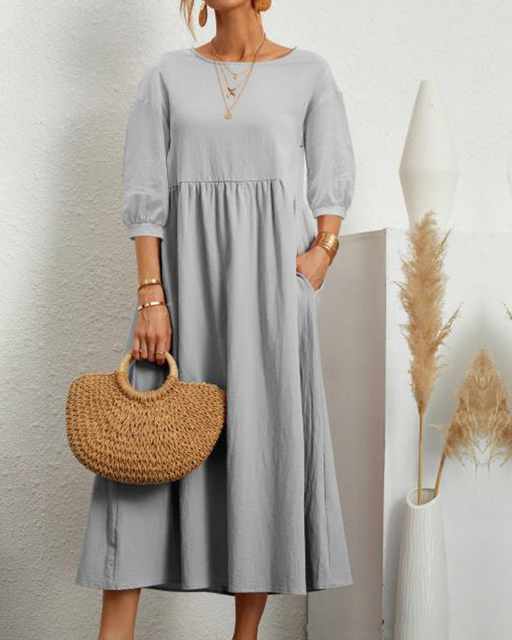 Das schmeichelhafte Damen Midikleid Selina mit Rundhalsausschnitt und Laternenärmeln für jede Figur.