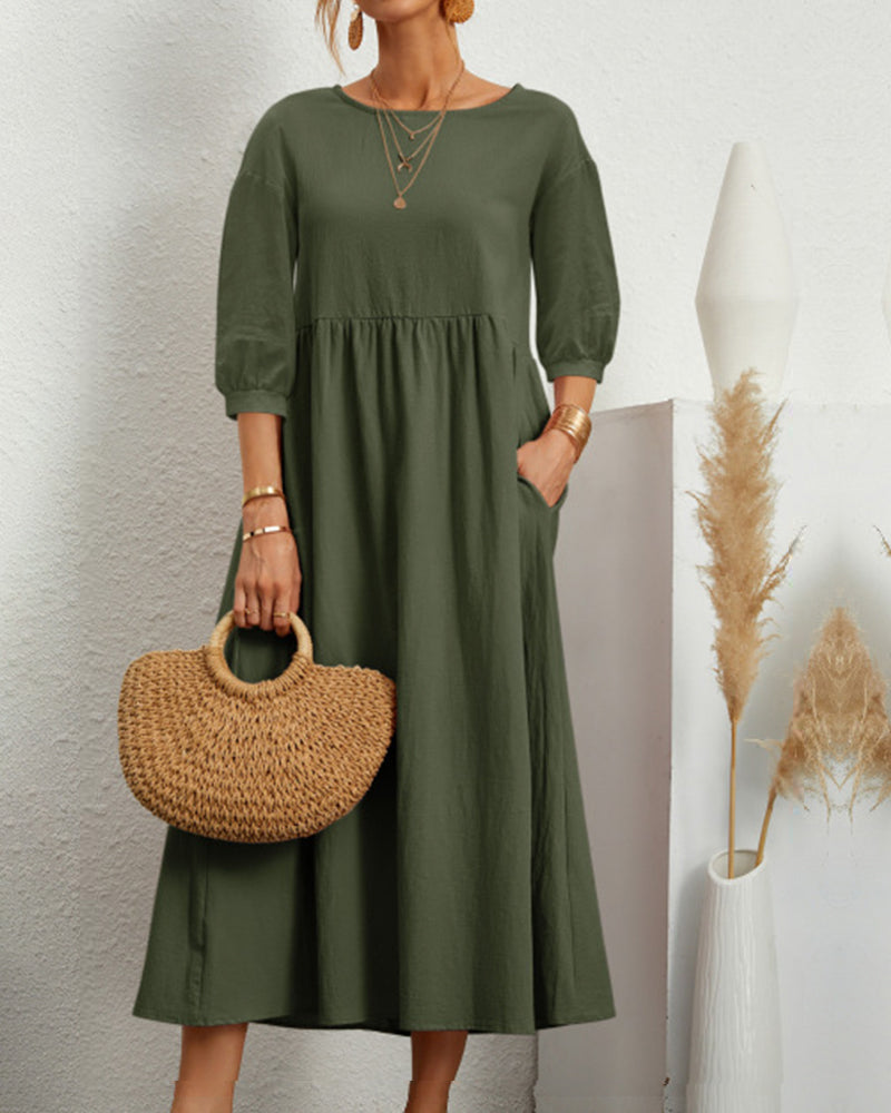 Damen Midikleid Selina mit Laternenärmeln elegant getragen, perfekt für Frühling, Sommer und Herbst.