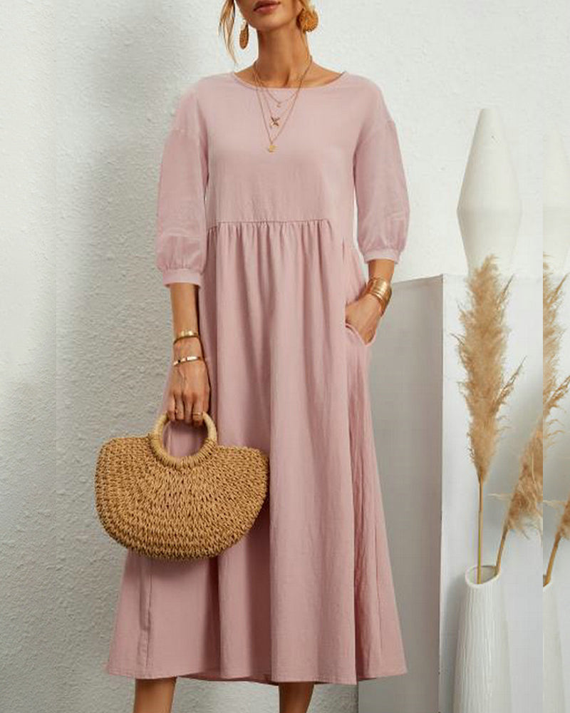Damen Midikleid Selina im Profil, Laternenärmel und fließender Schnitt für einen eleganten Gang.