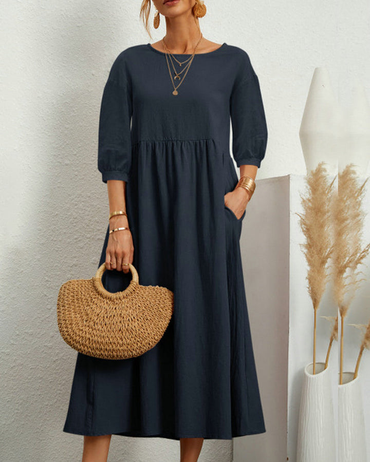 Das vielseitige Damen Midikleid Selina mit Laternenärmeln – ein Must-have für elegante Freizeitmode.