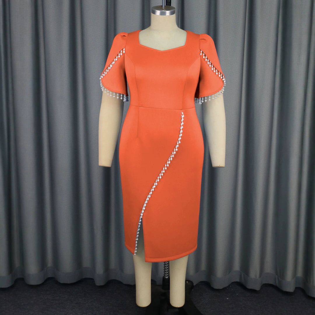 Figurbetontes Damen Partykleid mit Pailletten und Puffärmeln. Ideal als elegantes Abendkleid für glamouröse Anlässe.