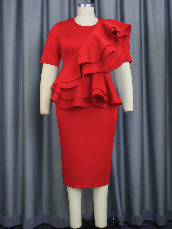 Elegantes Rüschenkleid mit Puffärmeln und tailliertem Schnitt für Damen, perfekt als Abend- oder Cocktailkleid.