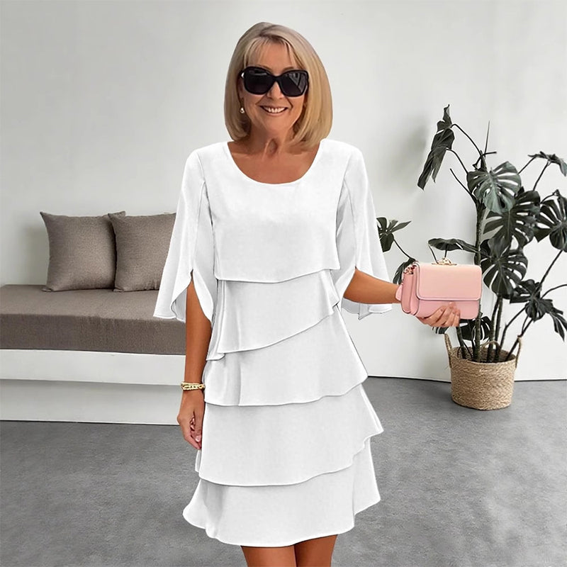 Chic Puffärmelkleid in Schichtoptik für Damen. Ein elegantes Freizeit- & Partykleid für modische Looks.