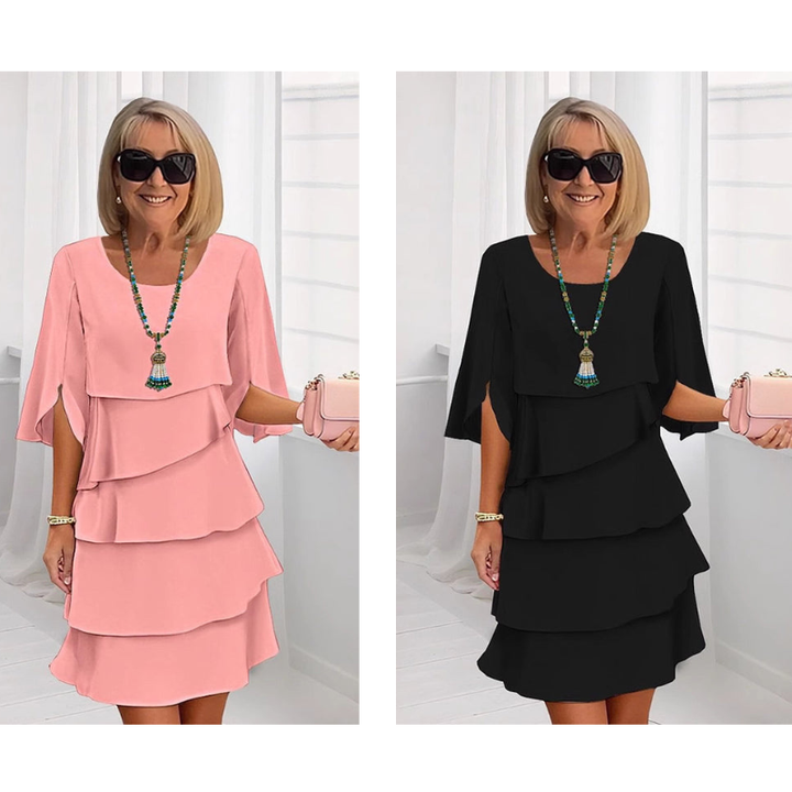 Damen Kurzarmkleid mit Schicht-Look & stylischen Puffärmeln. Ein chic & elegantes Sommerkleid.
