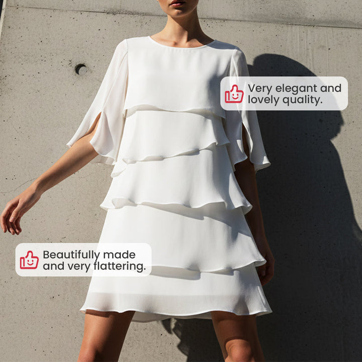 Modisches Damenkleid: Schichtkleid mit eleganten Puffärmeln. Ideal als Freizeit- oder Partykleid.