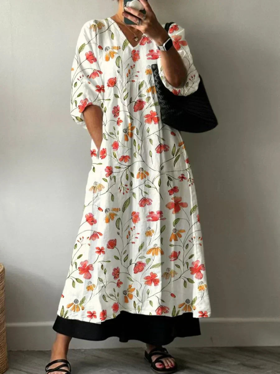 Elegantes Damen Sommerkleid mit buntem Blumenmuster im Boho-Chic Stil, perfekt für Strand, Freizeit & Urlaub.